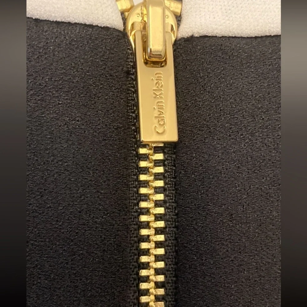 CLASSIC Calvin Klein black dress with white accents, flare sleeves, gold zipper - Picture 4 of 6